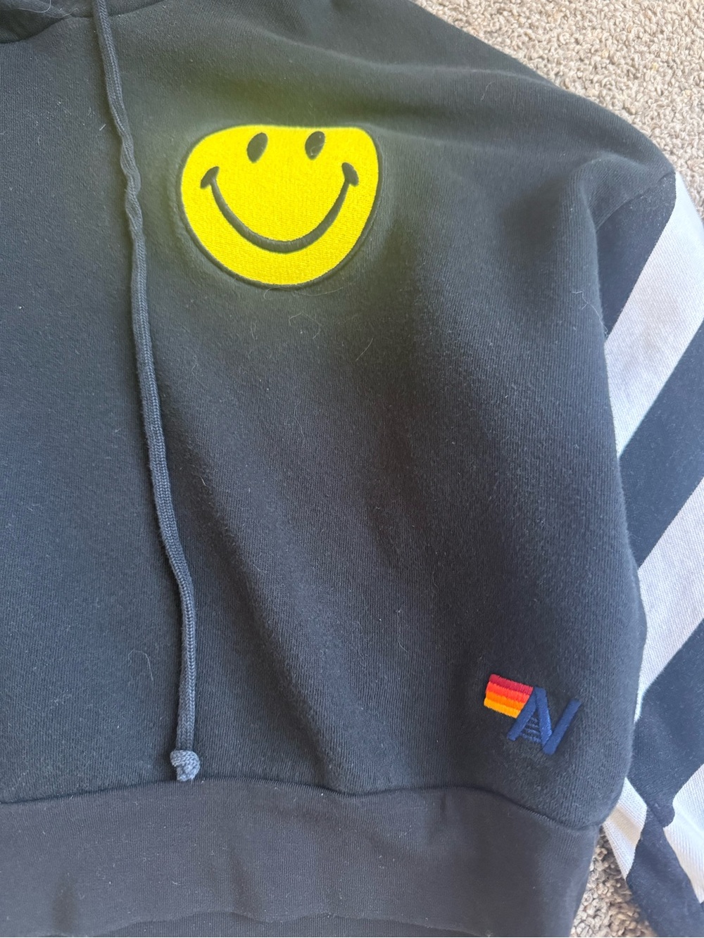 Aviator nation Caution Stripe Sleeve Smiley
Relaxed Hoodie in Black & White Xs - Picture 2 of 3